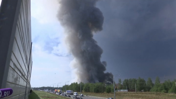 Smoke billows from massive fire at warehouse in Russia