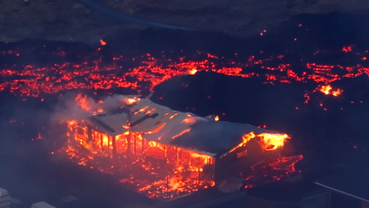 Iceland volcano eruption: House burns down as lava river surrounds building