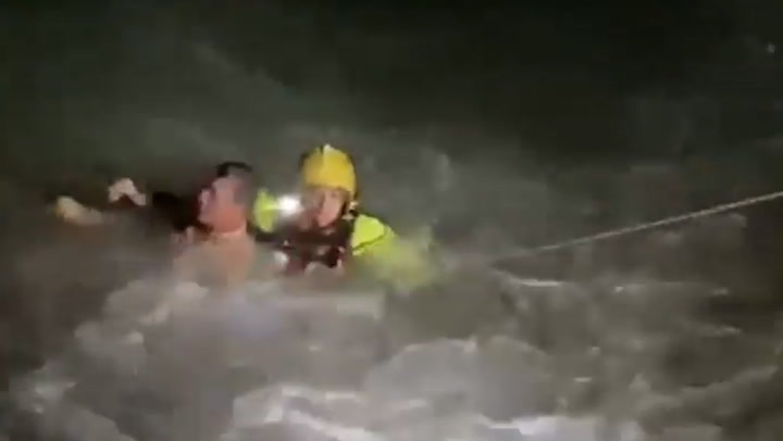 Swimmer rescued from 'treacherous' waves at night as RNLI issue stark warning