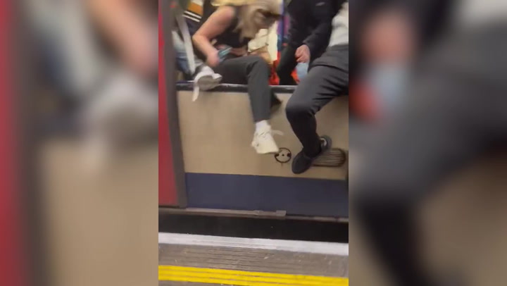 Panicked Londoners smash Tube windows to escape smoke-filled carriage