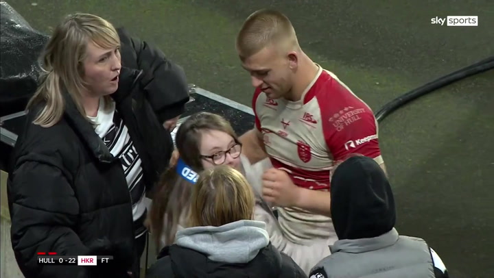 Hull KR's Mikey Lewis gives fan Player of the Match medal after Super League opening win