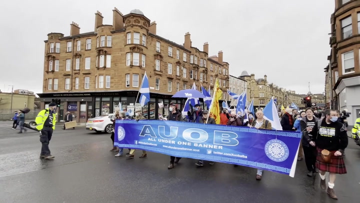 Protesters march in Glasgow calling for the 'end of Tory rule'