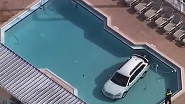 Florida: Woman rescued after car crashes into country club swimming pool