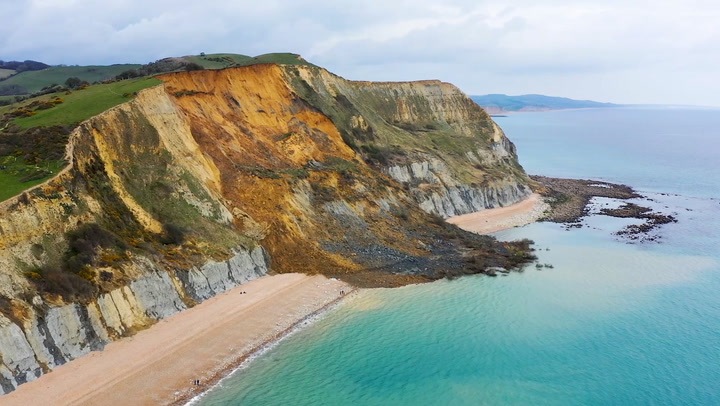 Huge rockfall covers beach with boulders on Dorset's Jurassic Coast