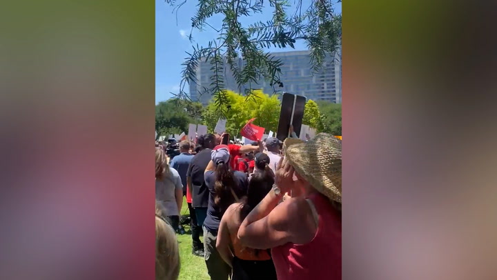 Protesters chant ‘shame’ during rally outside NRA convention