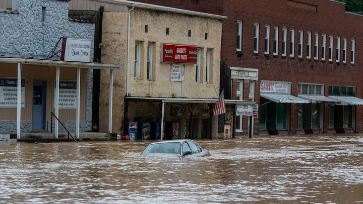 Kentucky streets inundated by fatal flooding as cars and houses become submerged