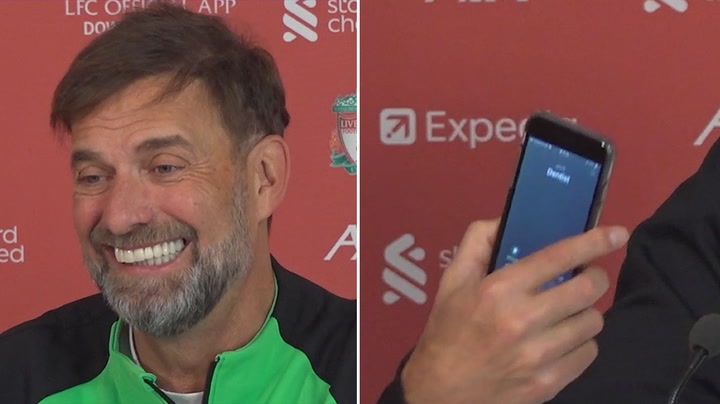 Klopp alerts journalist to call from dentist during press conference