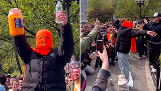Hundreds gather in New York to witness man eat jar of cheese balls