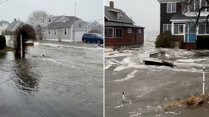Floodwater carries debris down street amid Maine storm