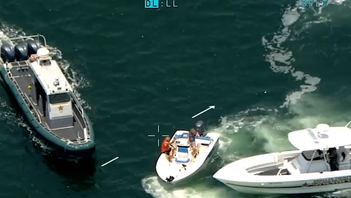 Aerial footage reveals how close 'unconscious' boat driver came to Florida swimmers
