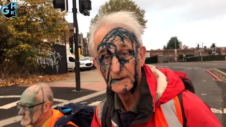 Insulate Britain protester covered in blue ink after furious driver lashes out