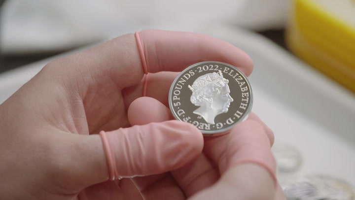 Royal Mint special coin collection features Queen's signature for the first time