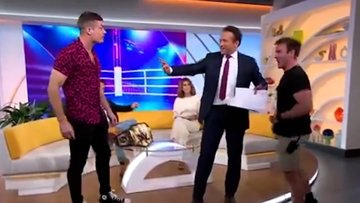 WWE wrestler threatens to fight producer live on air