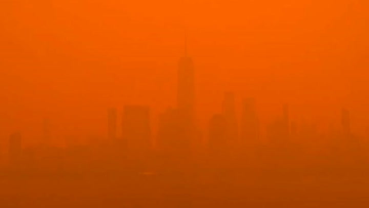 Apocalyptic time-lapse shows New York disappear into orange smoke from Canada wildfires