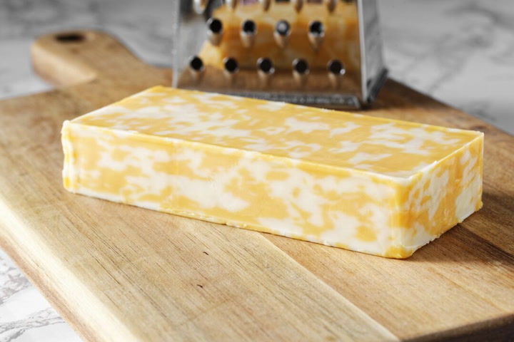 Cheddar vs Colby: Exploring Cheese Varieties