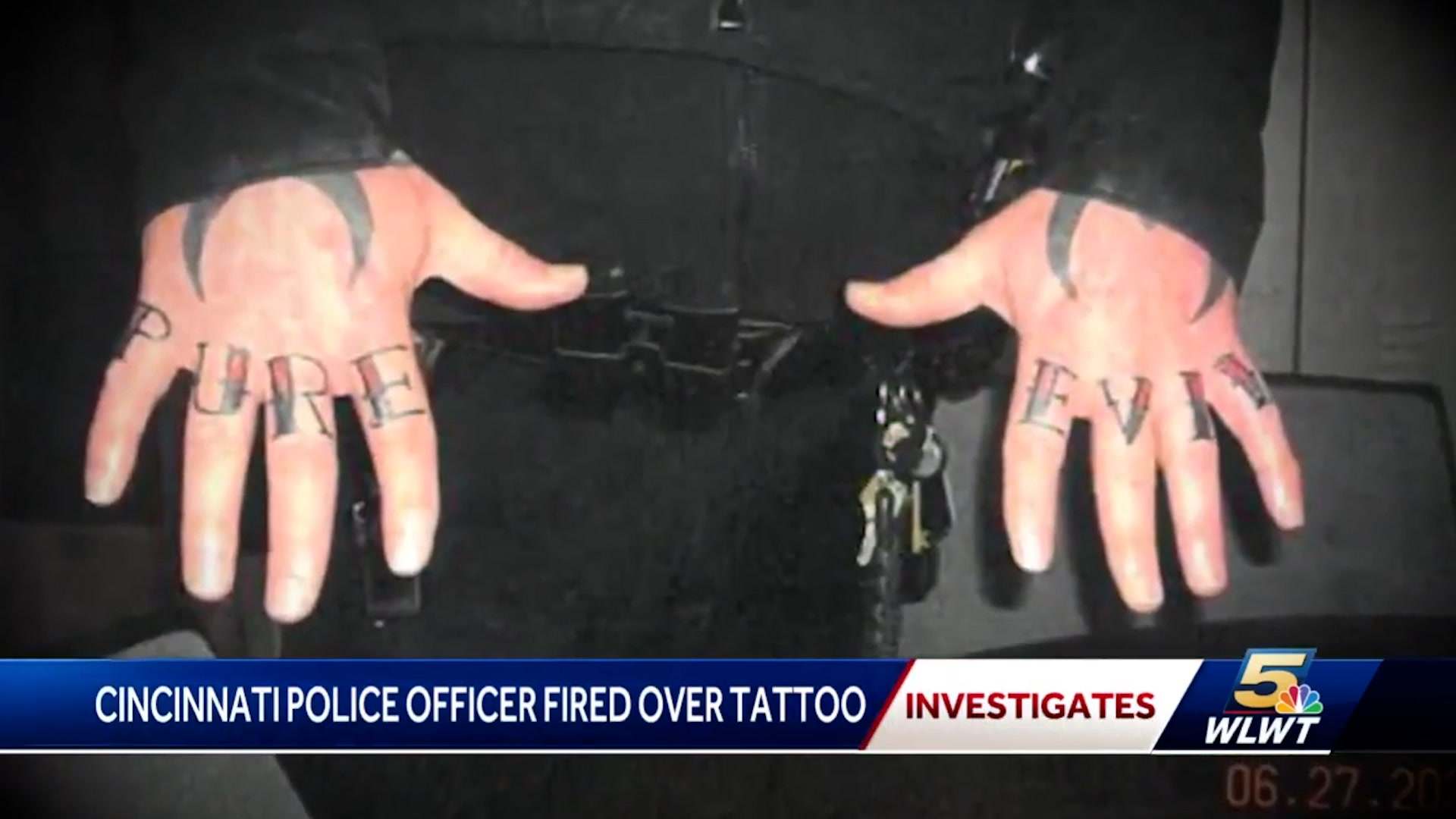 Ohio police officer fired for getting 'pure evil' tattooed on his fingers |  The Independent