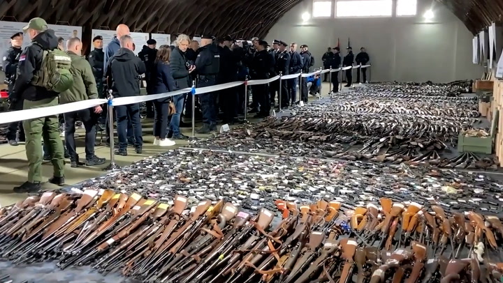 Serbian citizens surrender 13,000 unregistered weapons after two deadly mass shootings
