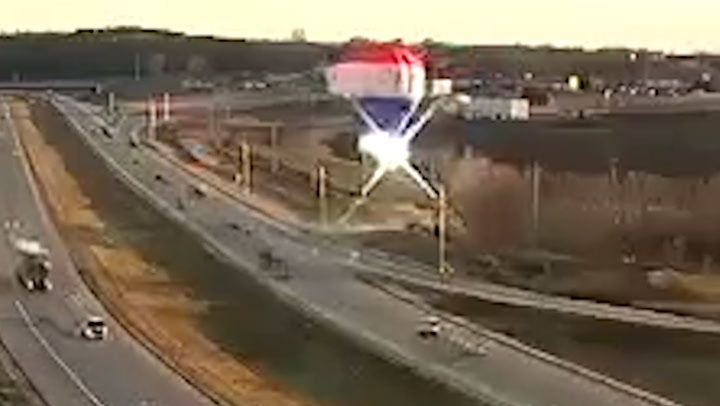 Hot air balloon bursts into flames after crashing into power lines in Minnesota