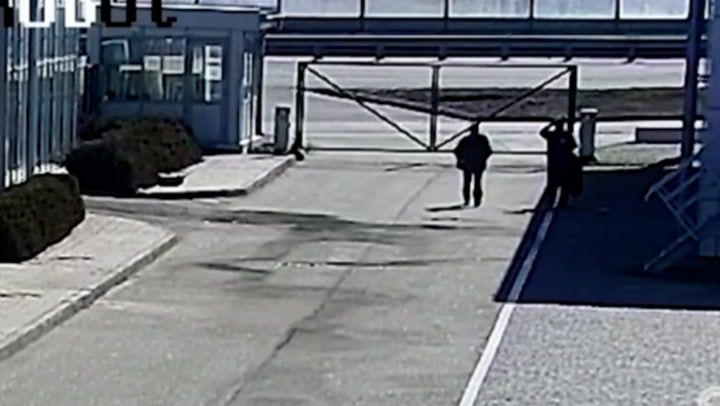 Russian soldiers captured on CCTV shooting unarmed civilians in back