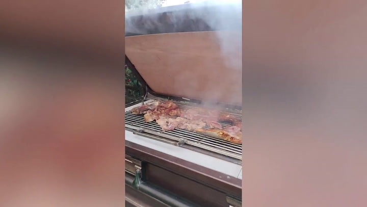 Undertaker turns old coffin into DIY home barbecue grill