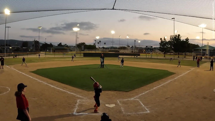 Moment stray bullet lands metres away from kids during youth baseball game