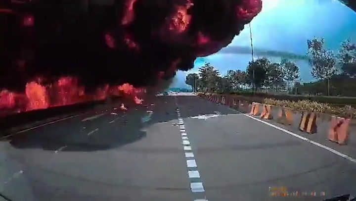 Horror moment private jet explodes in fireball when it crashes on road in Malaysia