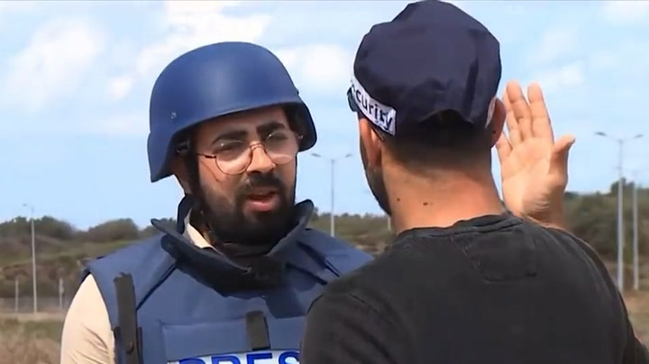 Israeli police officer threatens reporter live on air
