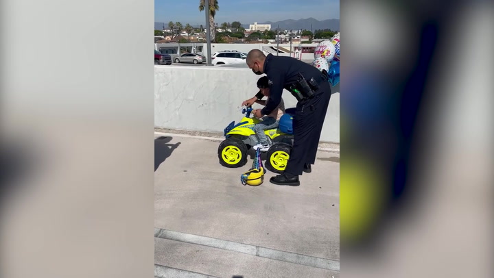 LAPD officers gift young boy quad bike after recovering from being hit by car