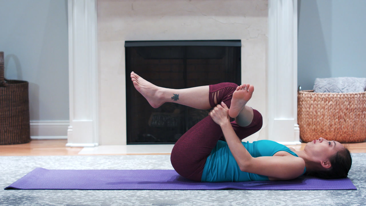 How to perform the lying cross over stretch for lower back pain 