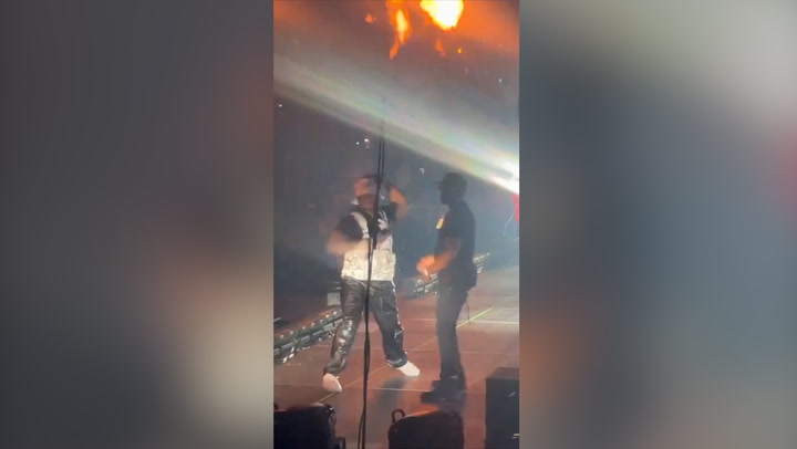 50 Cent appears to throw malfunctioning mic off stage during LA concert