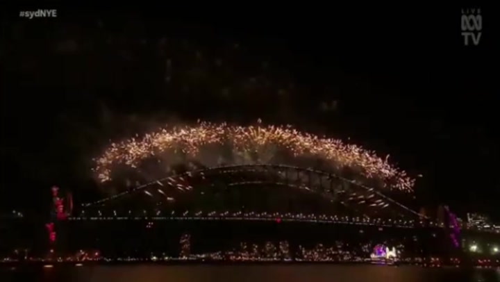 Fireworks welcome New Year in Sydney over Harbor Bridge