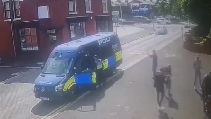 Police give football fans lift to the pub in riot van