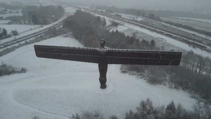 Angel of the North statue covered in snow as cold snap grips UK