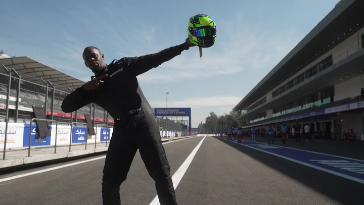 Usain Bolt takes record-breaking Formula E car for a spin