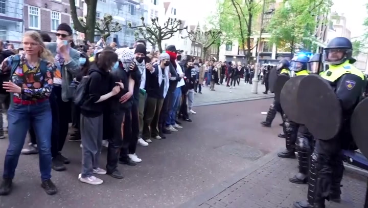 Pro-Palestinian student protesters clash with police in Amsterdam