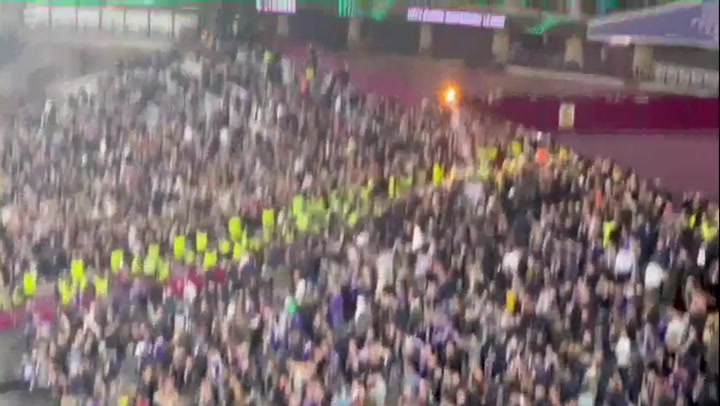 Fans throw flares and chairs as violence erupts at West Ham-Anderlecht match