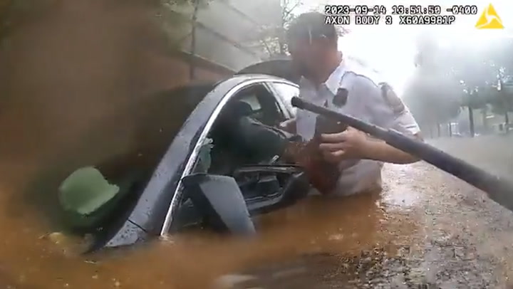 Police rescue trapped driver from car during Atlanta flood