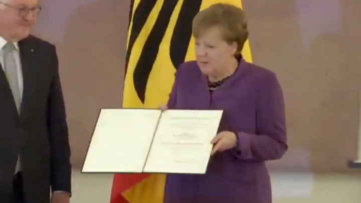 Angela Merkel receives Germany’s highest honour, Order of Merit