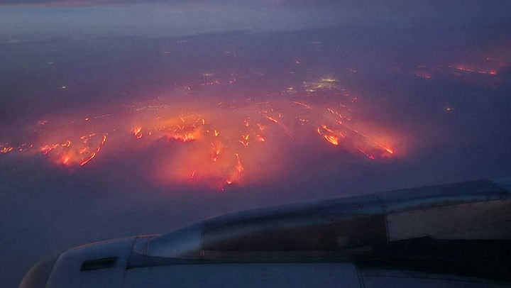 Plane flies over apocalyptic wildfire raging in Texas near nuclear weapons facility