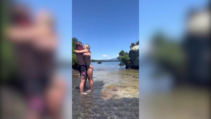 Couple who live 8,000 miles apart share heartwarming moment they get engaged