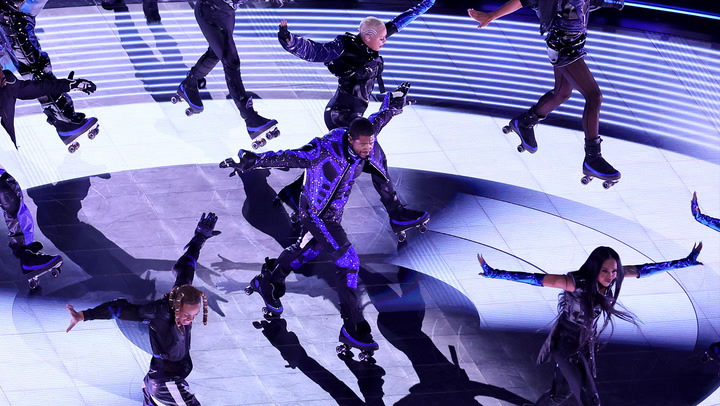 Usher performs Super Bowl half-time show on roller skates