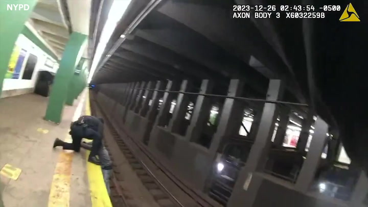 NYPD officers save man who fell onto subway tracks