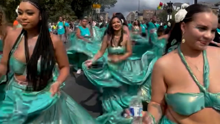 Dancers dazzle as Notting Hill Carnival parades through London