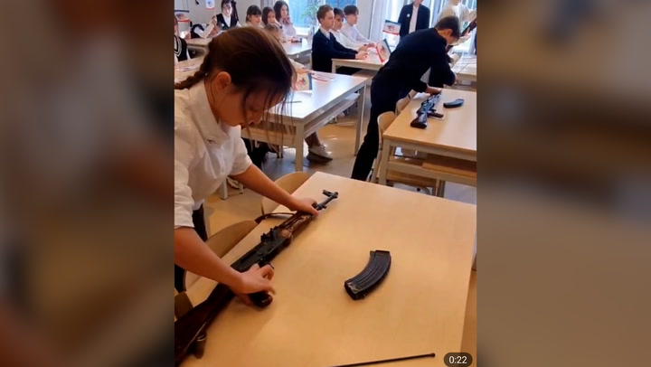 Crimea schoolchildren learn to load rifles in classroom
