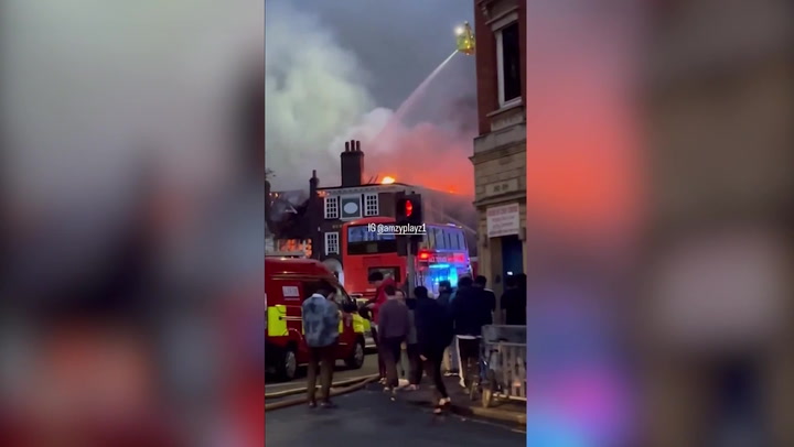 Dozens of firefighters called to battle blaze at historic London pub
