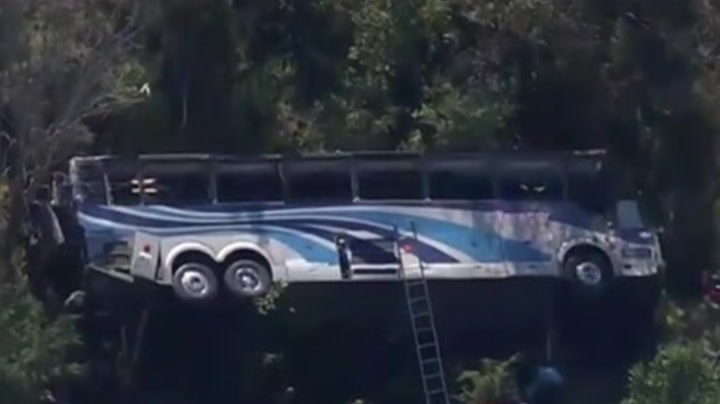 Overturned bus seen in aerial footage after crashing with high school band onboard