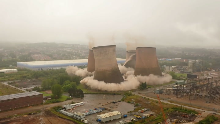 Cooling towers demolished in controlled explosion
