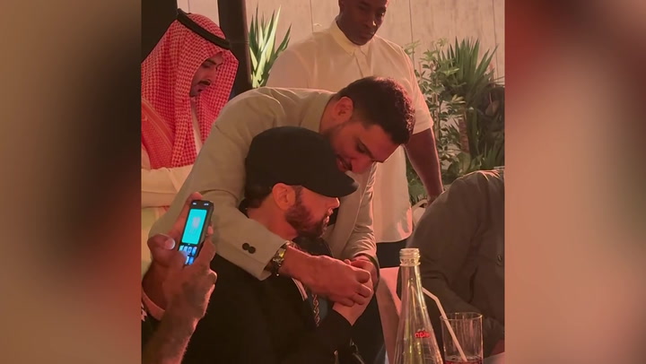Amir Khan gifts Eminem luxury watch before telling fan 'STFU' over backlash to gesture
