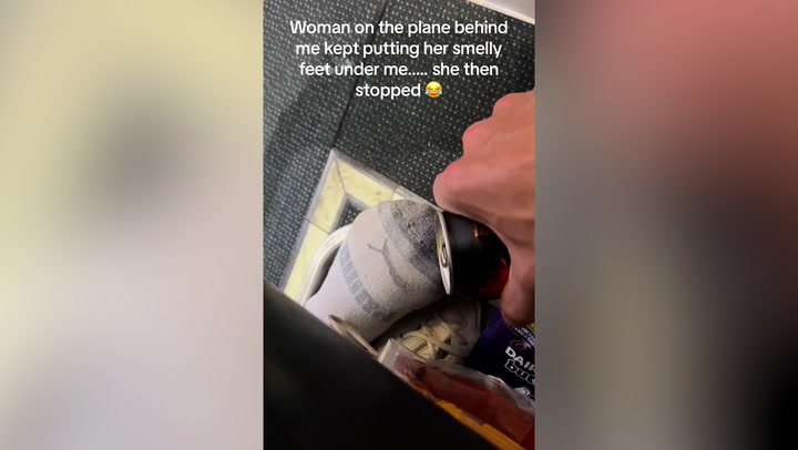 Man takes revenge on plane passenger who pushed her ‘smelly feet’ under his seat