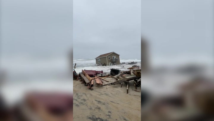 North Carolina beach house collapses into ocean and floats away